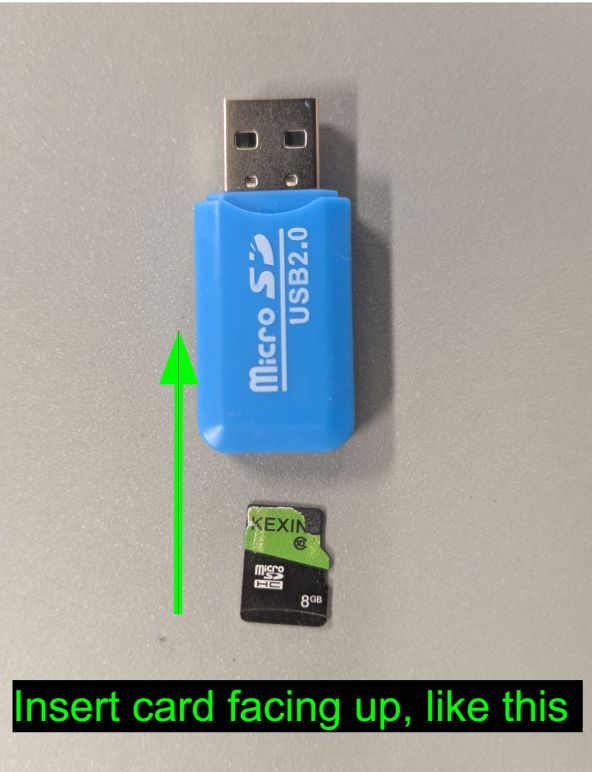 Orientation for inserting the microSD card into the USB adapter